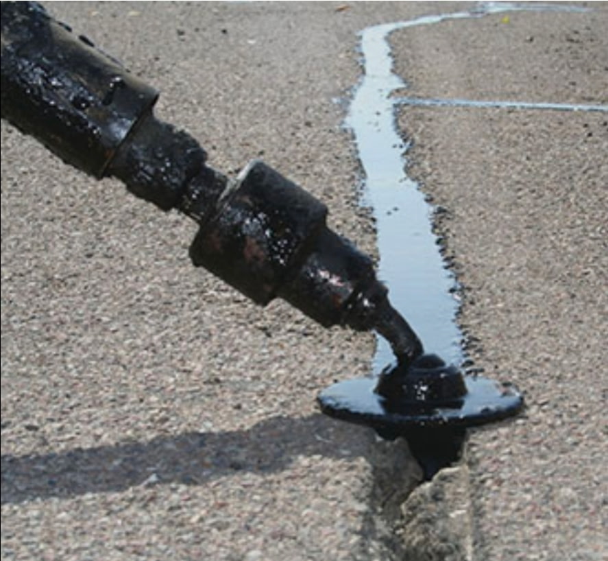 Filling a large crack in asphalt