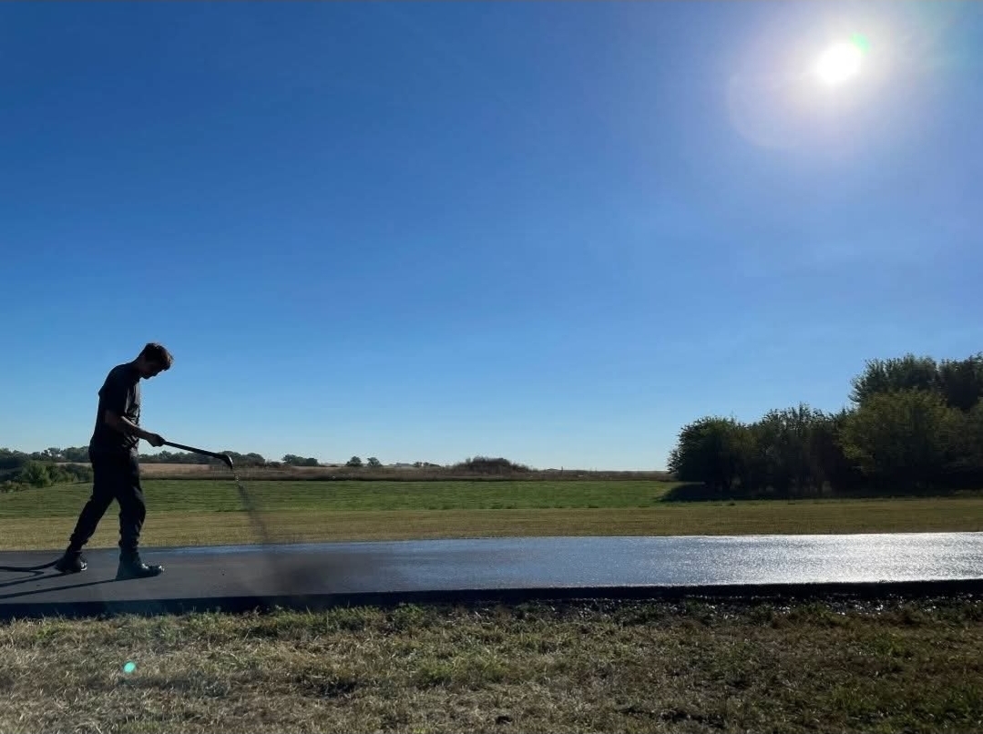 Close-up of freshly sealed asphalt texture