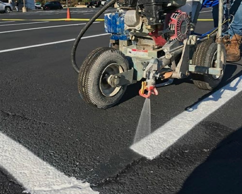 Striping machine in action